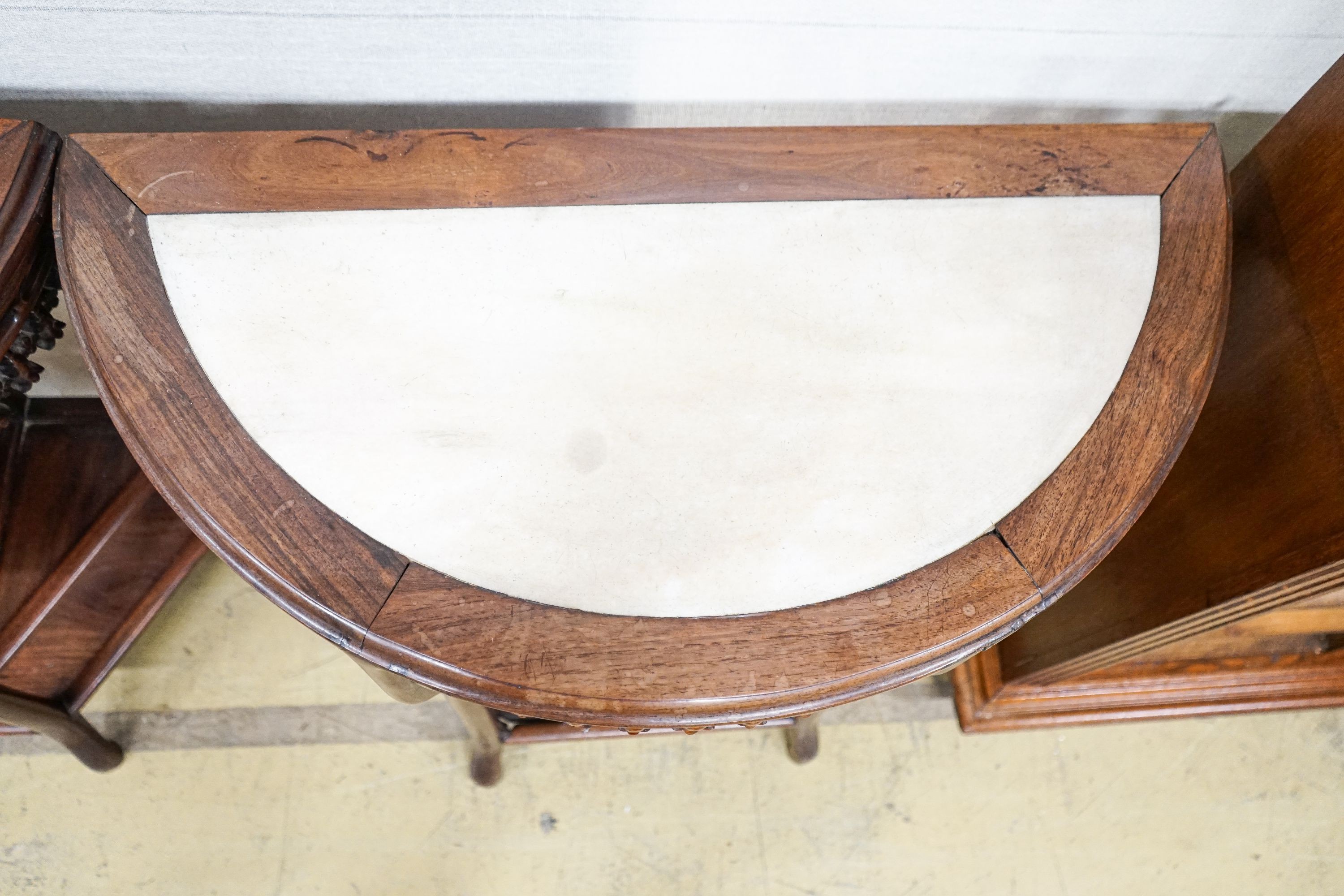 A pair of Chinese marble-topped demi lune console tables, width 82cm, depth 40cm, height 80cm
